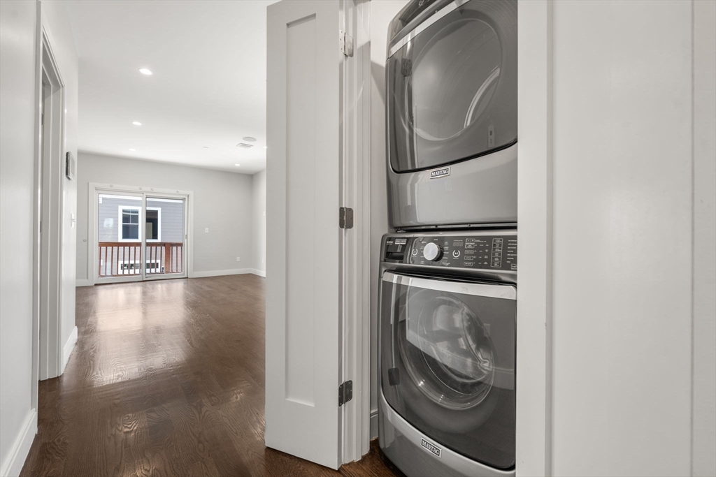 7 Langford Park, Unit 3 Boston, MA 02119 - Photo 14 of 16 a view of a kitchen with washer and dryer