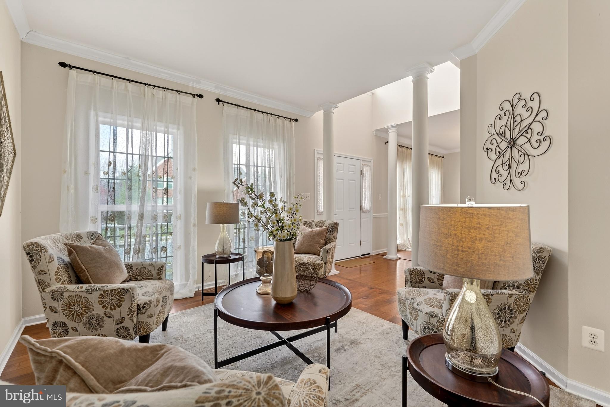 169 Thomas Jefferson Terrace Elkton, MD 21921 - Photo 12 of 64 a living room with furniture and a floor to ceiling window