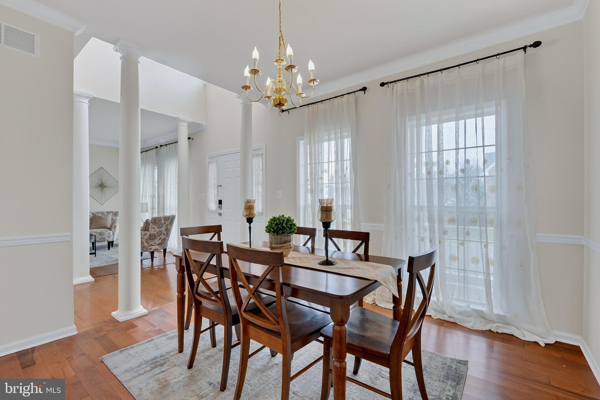 169 Thomas Jefferson Terrace Elkton, MD 21921 - Photo 13 of 64 a view of a dining room with furniture and wooden floor