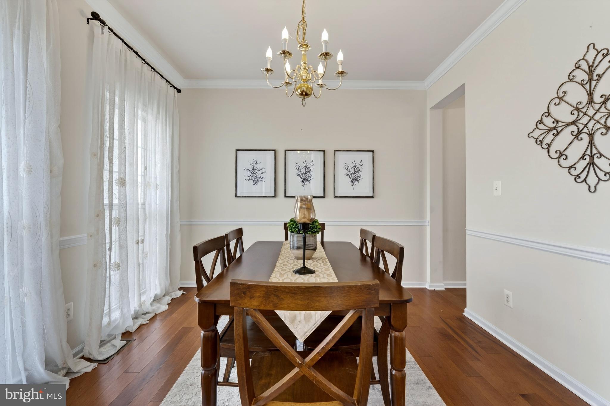 169 Thomas Jefferson Terrace Elkton, MD 21921 - Photo 14 of 64 a view of a dining room with furniture and chandelier