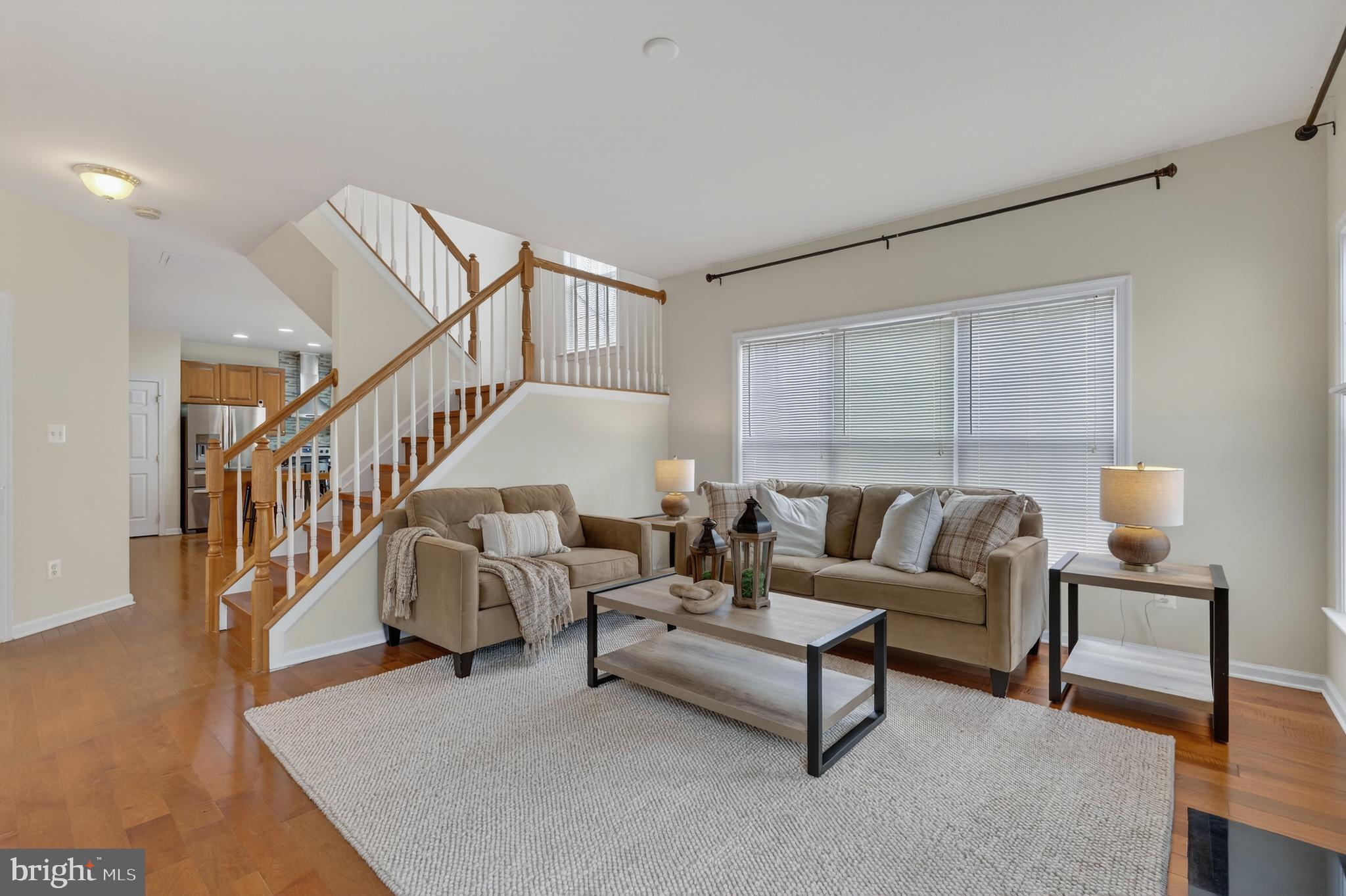 169 Thomas Jefferson Terrace Elkton, MD 21921 - Photo 17 of 64 a living room with furniture and stairs