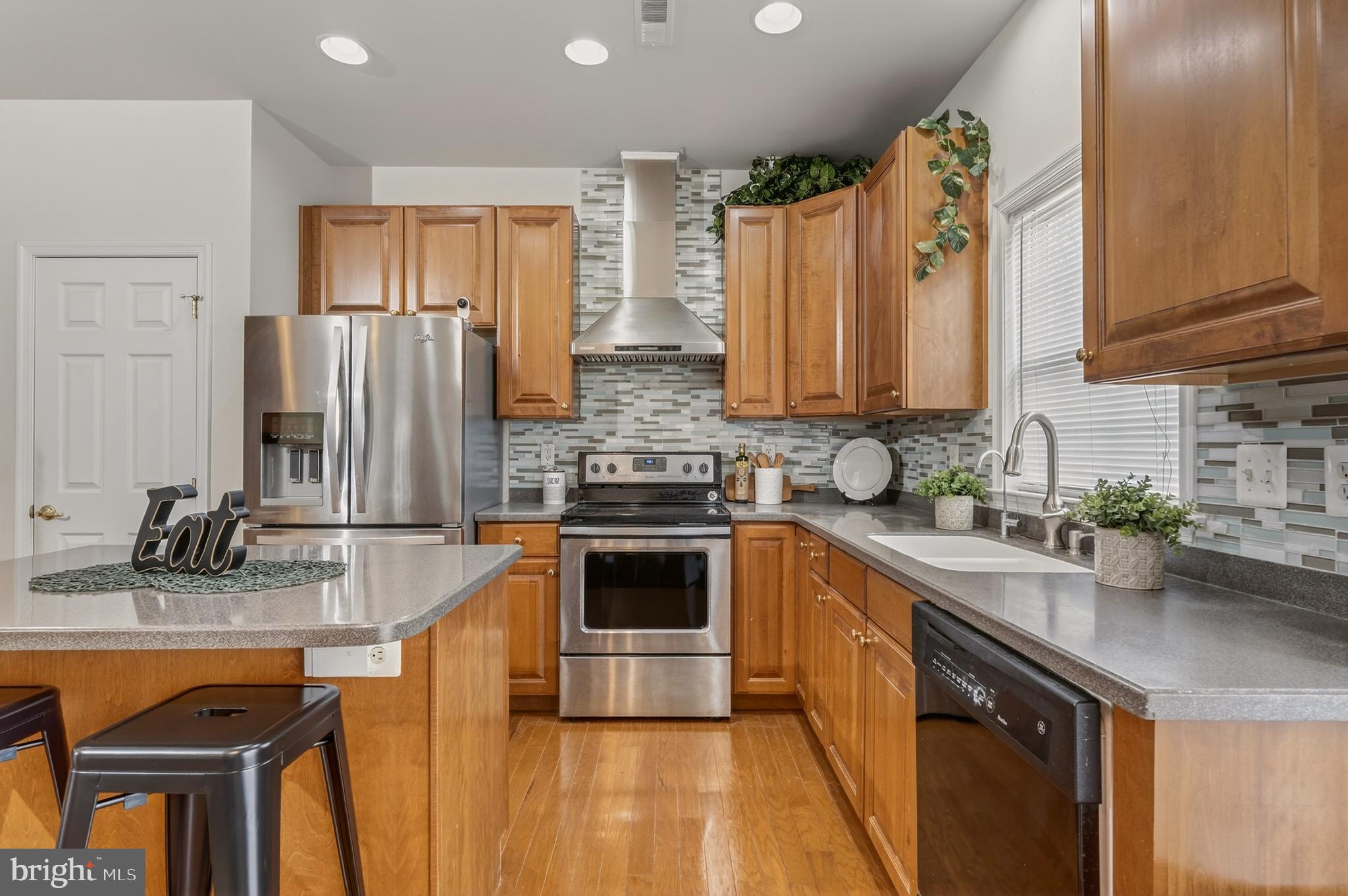169 Thomas Jefferson Terrace Elkton, MD 21921 - Photo 24 of 64 a kitchen with stainless steel appliances granite countertop a sink stove and refrigerator