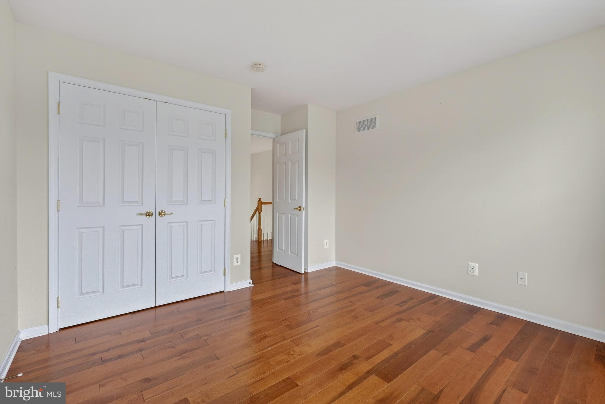 169 Thomas Jefferson Terrace Elkton, MD 21921 - Photo 39 of 64 a view of an empty room with wooden floor