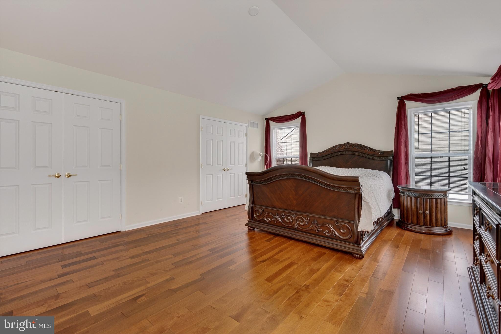 169 Thomas Jefferson Terrace Elkton, MD 21921 - Photo 41 of 64 a bedroom with a bed and wooden floor