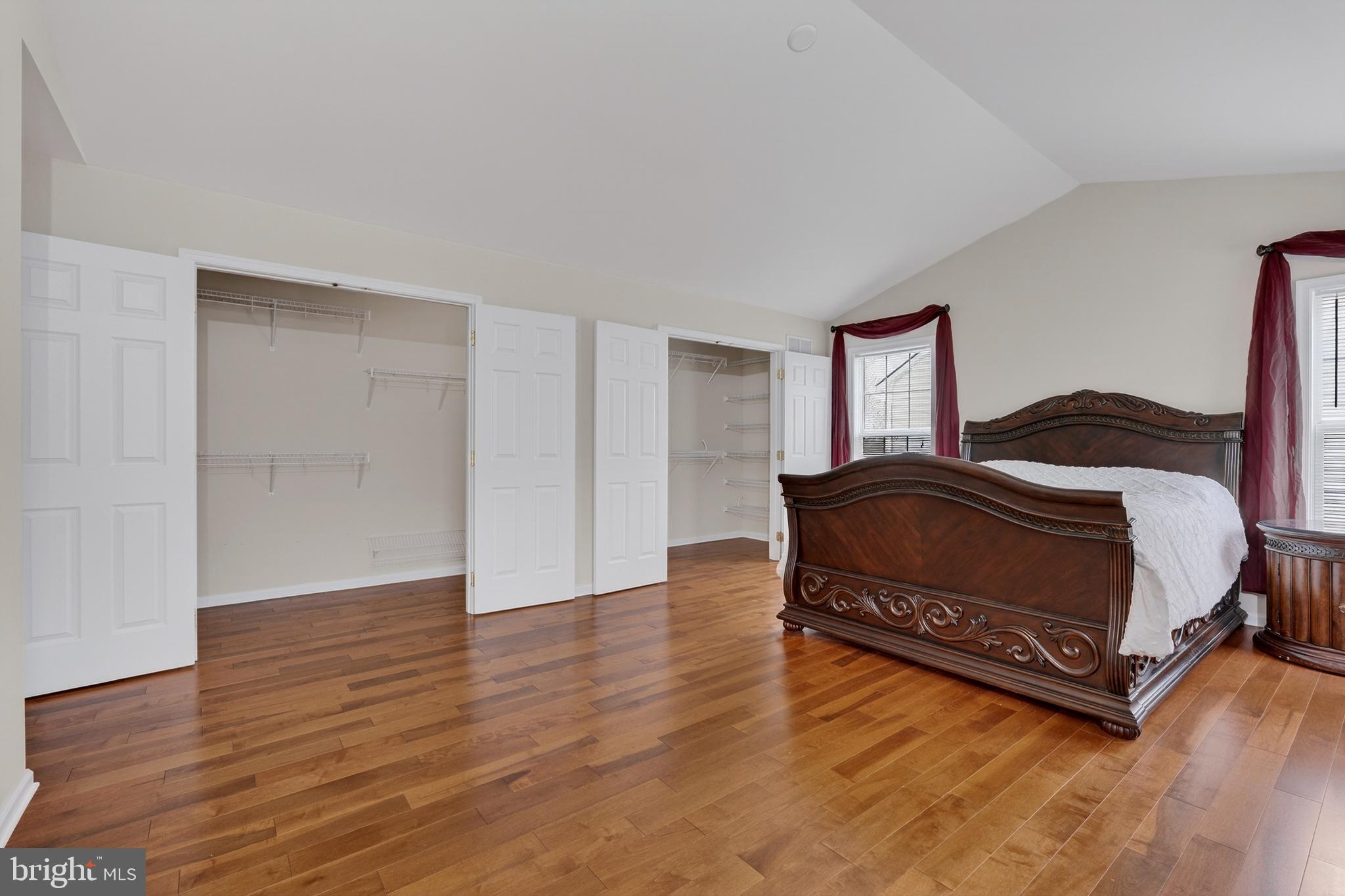 169 Thomas Jefferson Terrace Elkton, MD 21921 - Photo 42 of 64 a bedroom with a bed and wooden floor