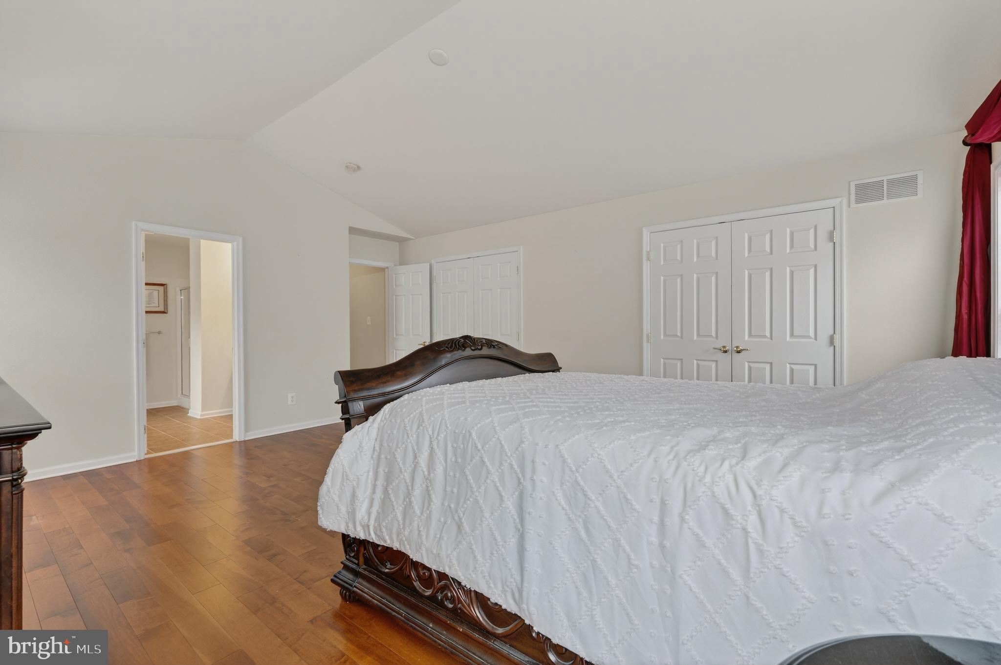 169 Thomas Jefferson Terrace Elkton, MD 21921 - Photo 44 of 64 a bedroom with a bed and wooden floor