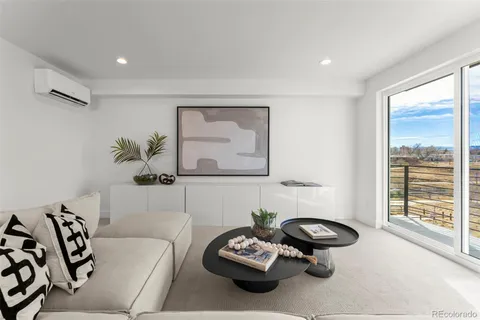 a kitchen with a sink a stove and cabinets