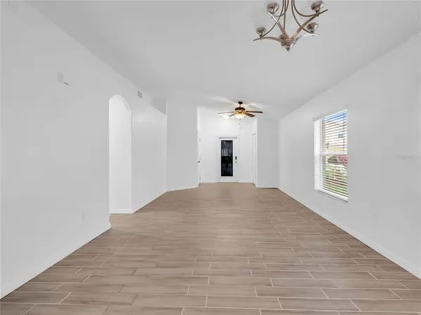 a view of empty room with a window