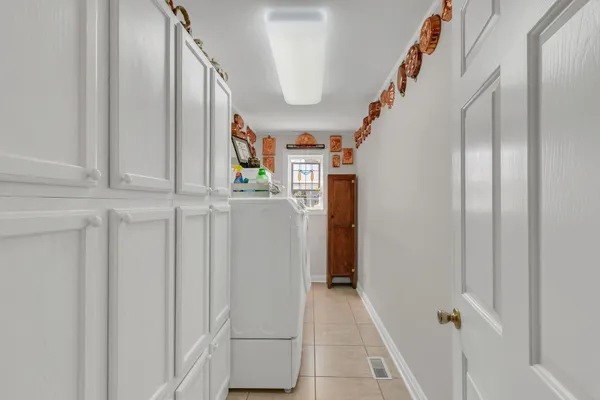a view of entryway with furniture and entryway