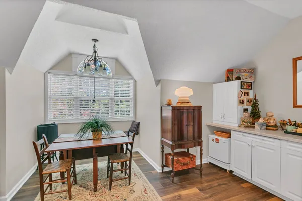 a workspace with furniture and window