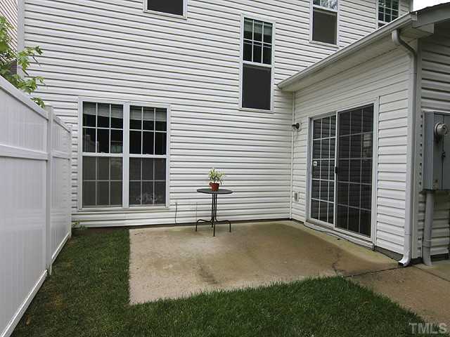 1127 Lake Moraine Place Raleigh, NC 27607 - Photo 21 of 23 a view of house with backyard and a window