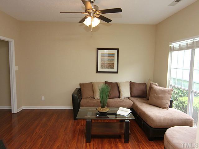 1127 Lake Moraine Place Raleigh, NC 27607 - Photo 5 of 23 a living room with furniture and a window