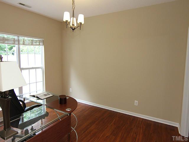 1127 Lake Moraine Place Raleigh, NC 27607 - Photo 7 of 23 a view of workspace with wooden floor