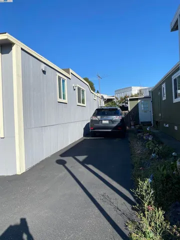 a view of a car in front of a house
