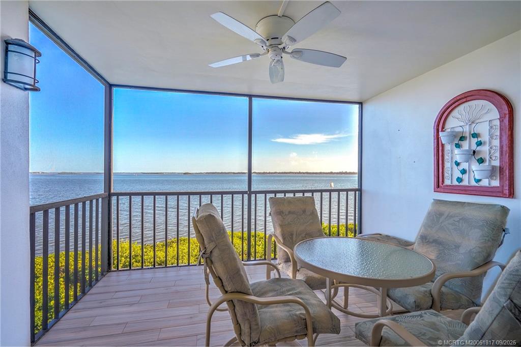 10 Northeast Plantation Road, Unit 203 Stuart, FL 34996 - Photo 2 of 50 a view of a dining room with furniture window and wooden floor