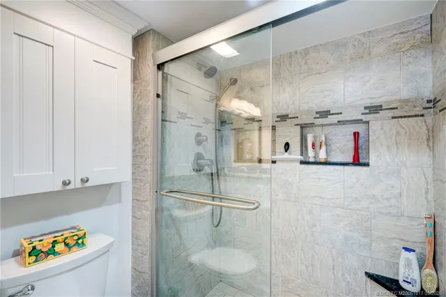 a balcony with table and chairs