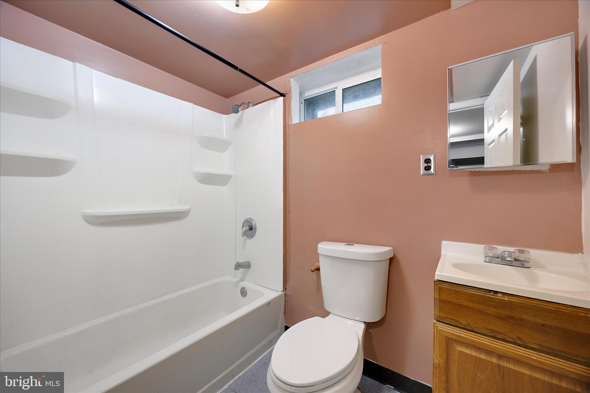 518 Kintop Road Glen Burnie, MD 21061 - Photo 28 of 33 a white toilet sitting next to a bath tub shower