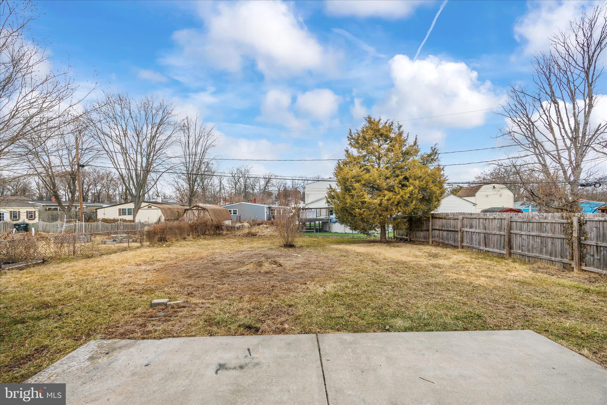 518 Kintop Road Glen Burnie, MD 21061 - Photo 31 of 33 a view of a yard with large trees
