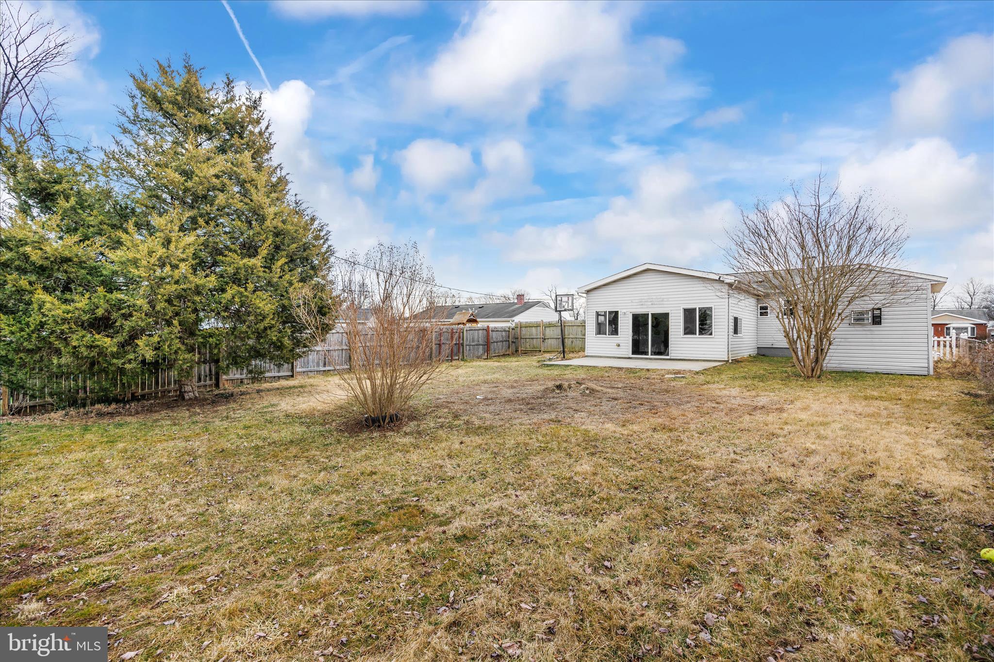 518 Kintop Road Glen Burnie, MD 21061 - Photo 32 of 33 a front view of a house with a yard
