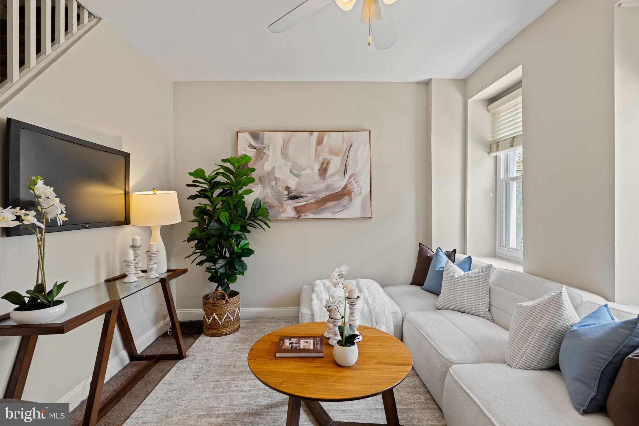4092 Pechin Street Philadelphia, PA 19128 - Photo 1 of 28 a living room with furniture and a potted plant