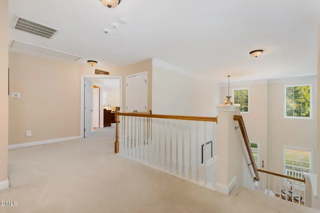a view of a hallway with closet