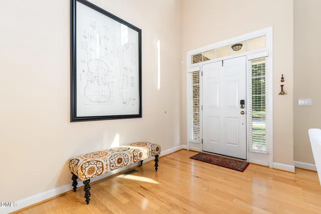 a view of a livingroom with the furniture and window