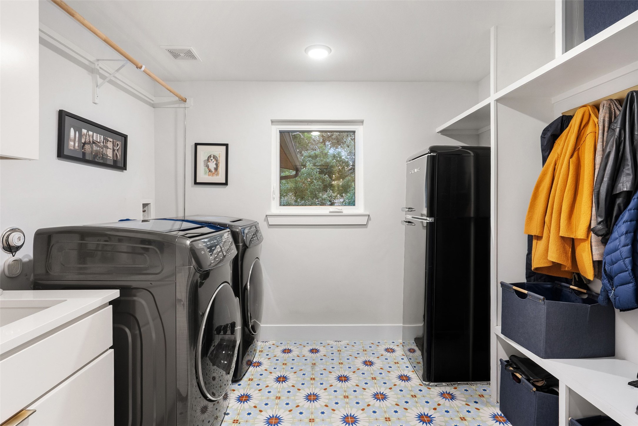 3302 Cherry Tree Circle Austin, TX 78731 - Photo 23 of 39 Laundry/mudroom with built in storage and additional fridge