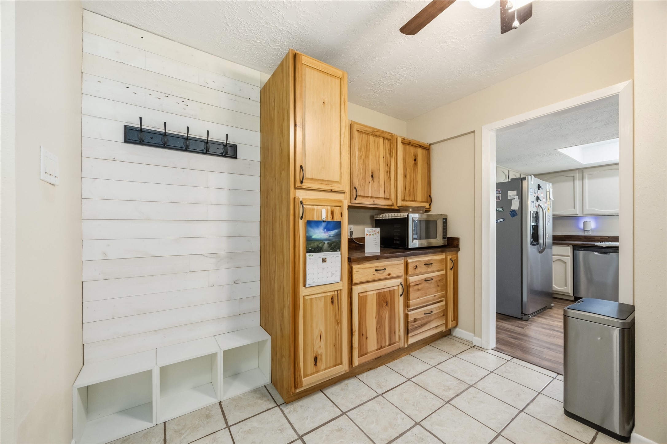 9635 Birsay Street Spring, TX 77379 - Photo 10 of 24 a kitchen with stainless steel appliances cabinets and a counter top space