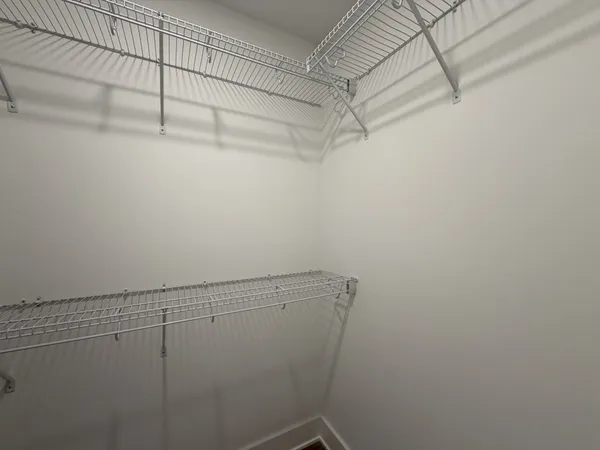 a view of a room with racks on the wall