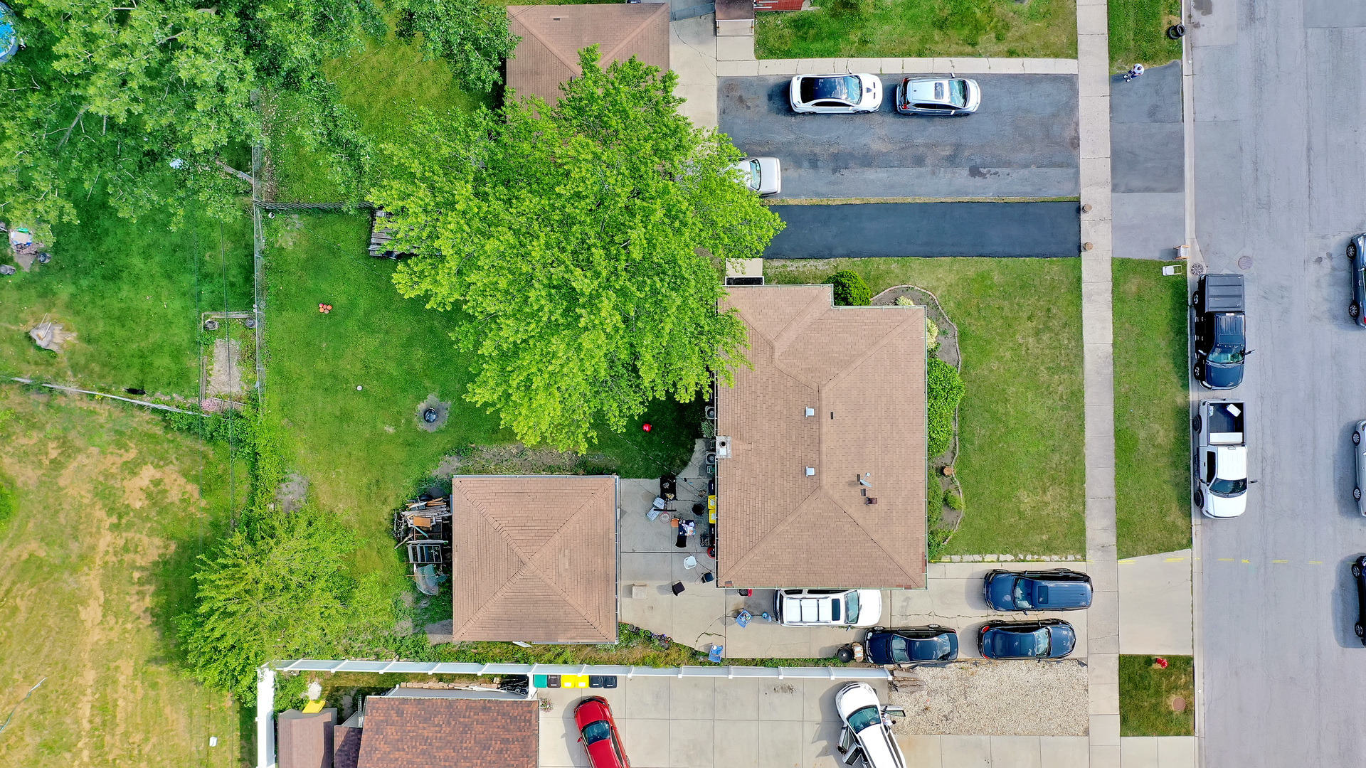 10601 Mason Avenue Chicago Ridge, IL 60415 - Photo 13 of 18 an aerial view of a house with a yard