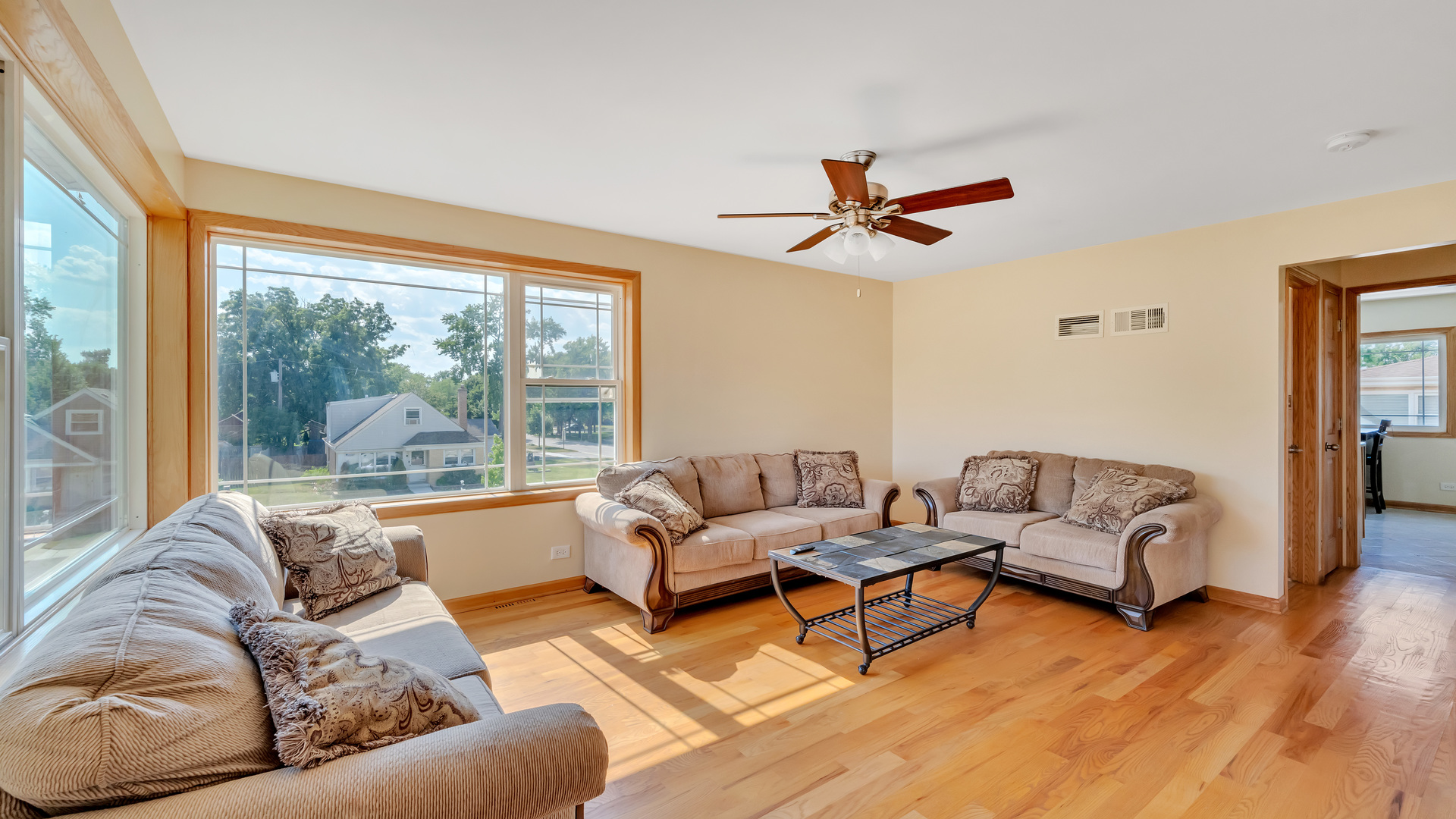 10601 Mason Avenue Chicago Ridge, IL 60415 - Photo 7 of 18 a living room with furniture and a large window