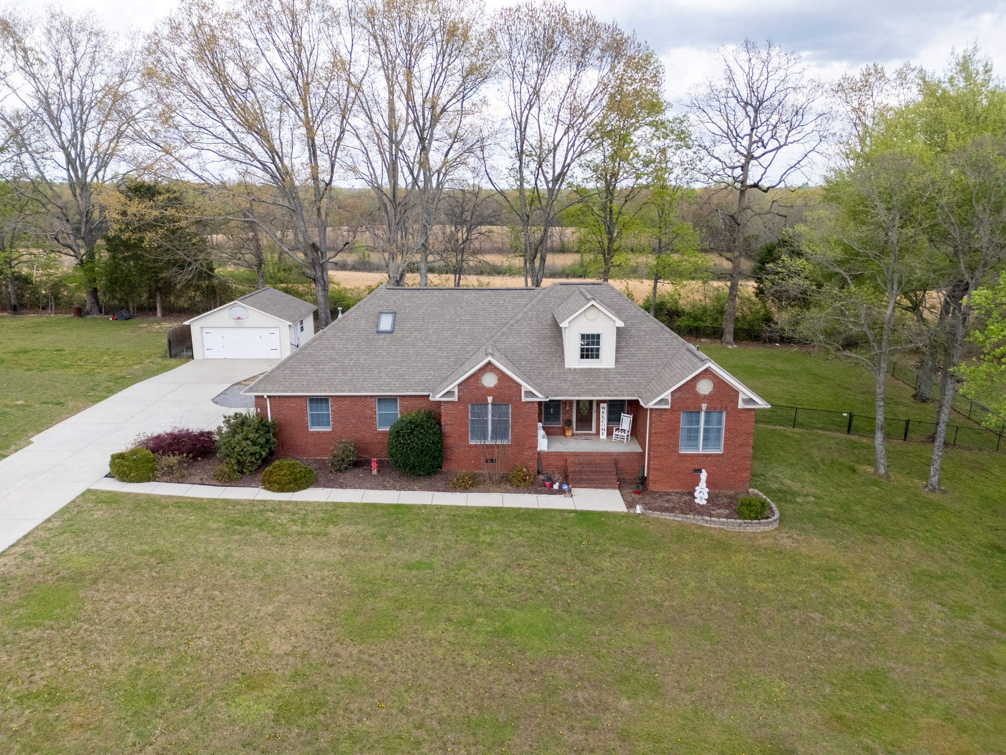 front view of a house with a yard