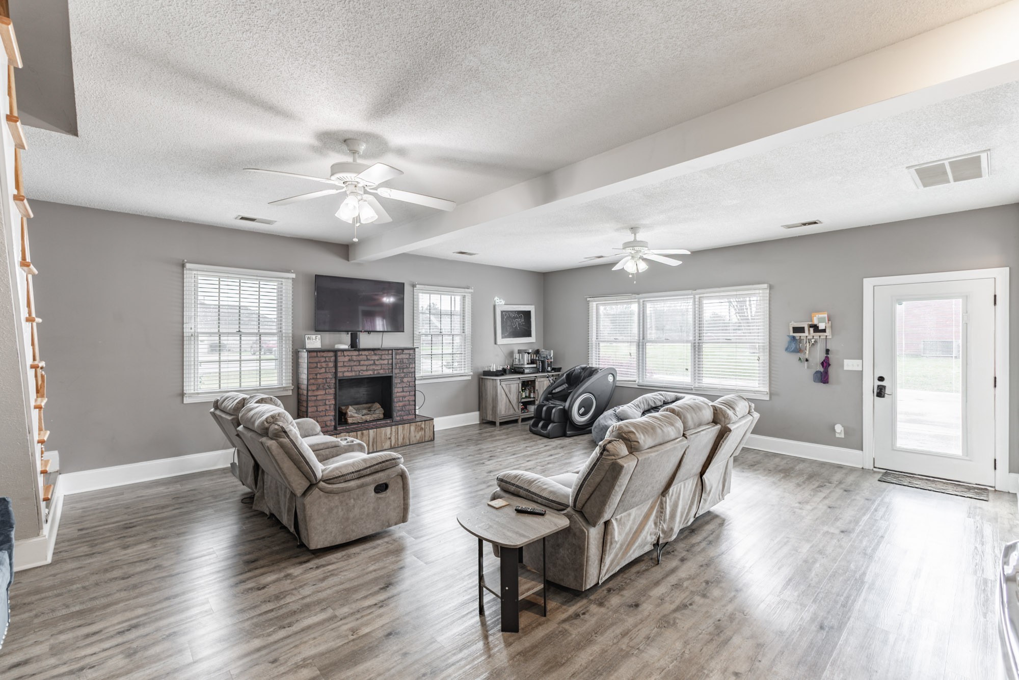 61 Eastridge Road Fayetteville, TN 37334 - Photo 16 of 42 a living room with fireplace furniture and a wooden floor