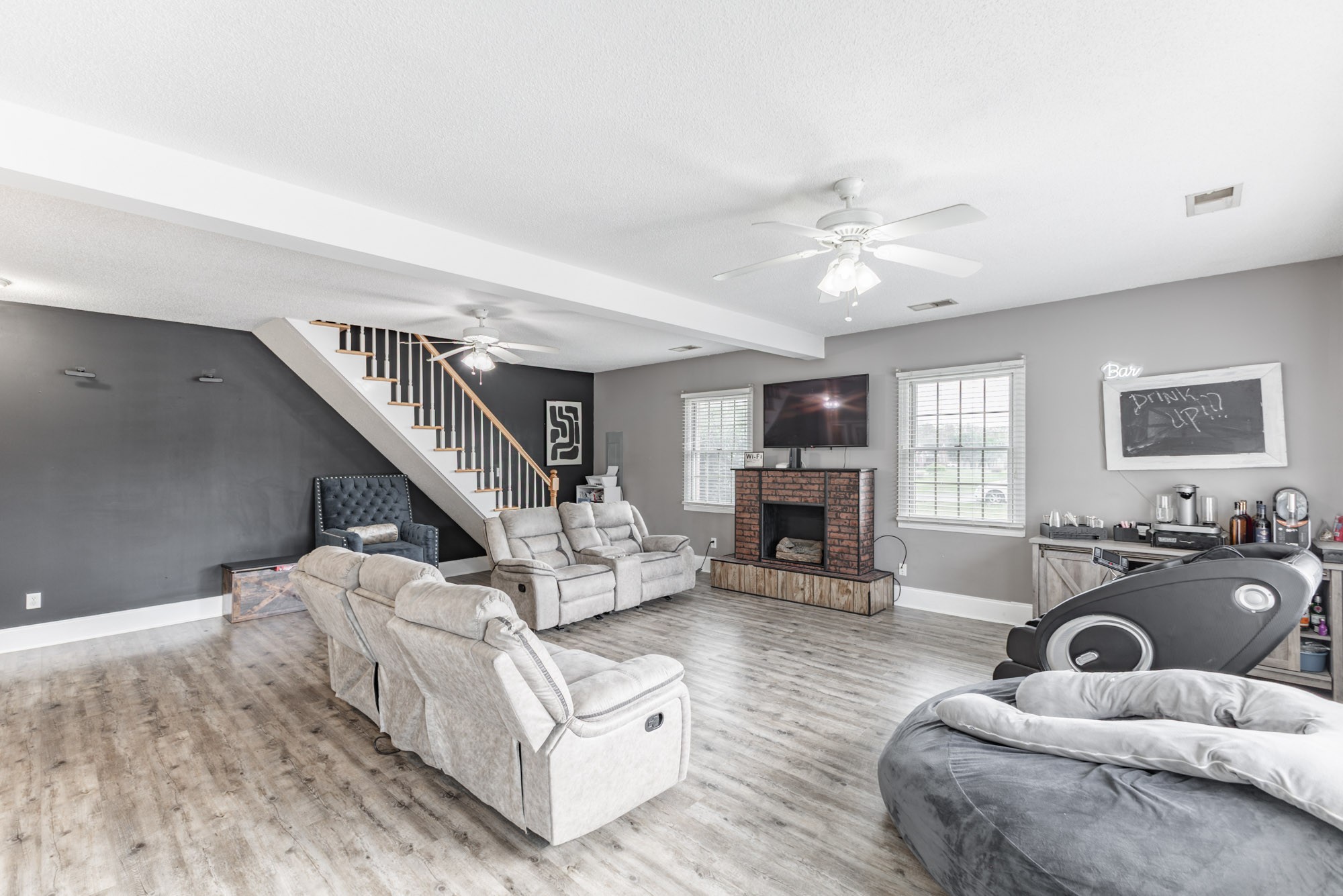 61 Eastridge Road Fayetteville, TN 37334 - Photo 17 of 42 a living room with furniture and a fireplace