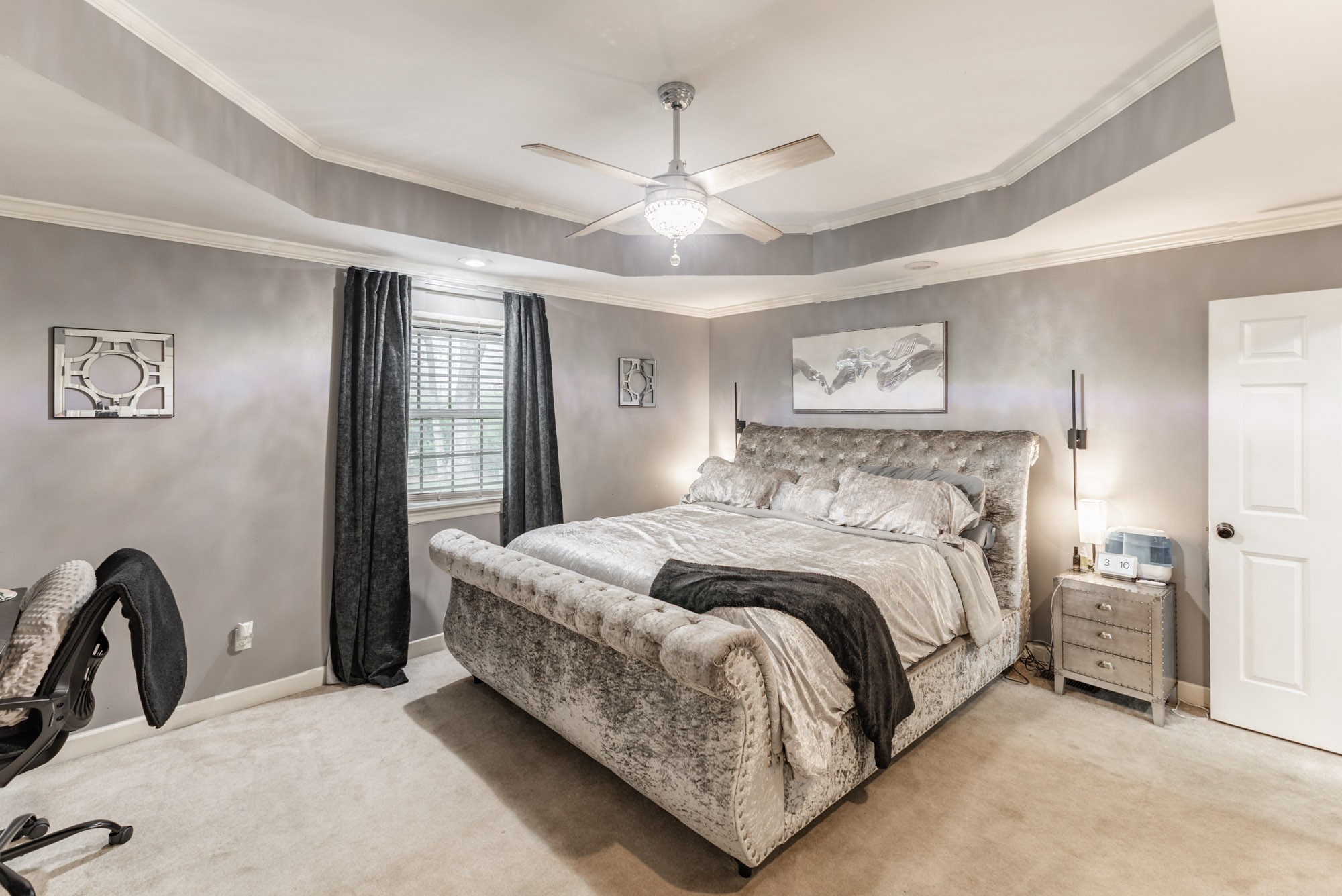 61 Eastridge Road Fayetteville, TN 37334 - Photo 19 of 42 a bedroom with a bed a ceiling fan and a dresser
