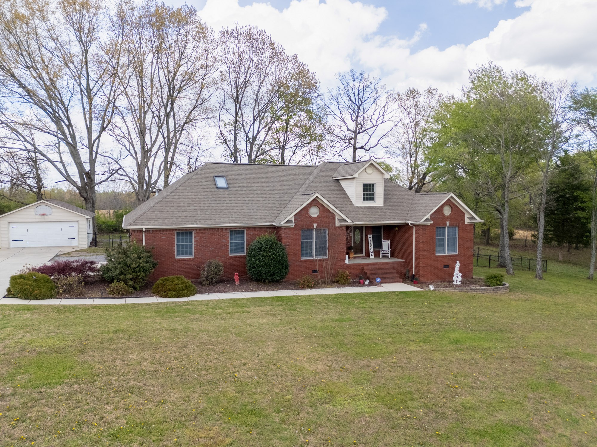 61 Eastridge Road Fayetteville, TN 37334 - Photo 2 of 42 a front view of house with yard and green space