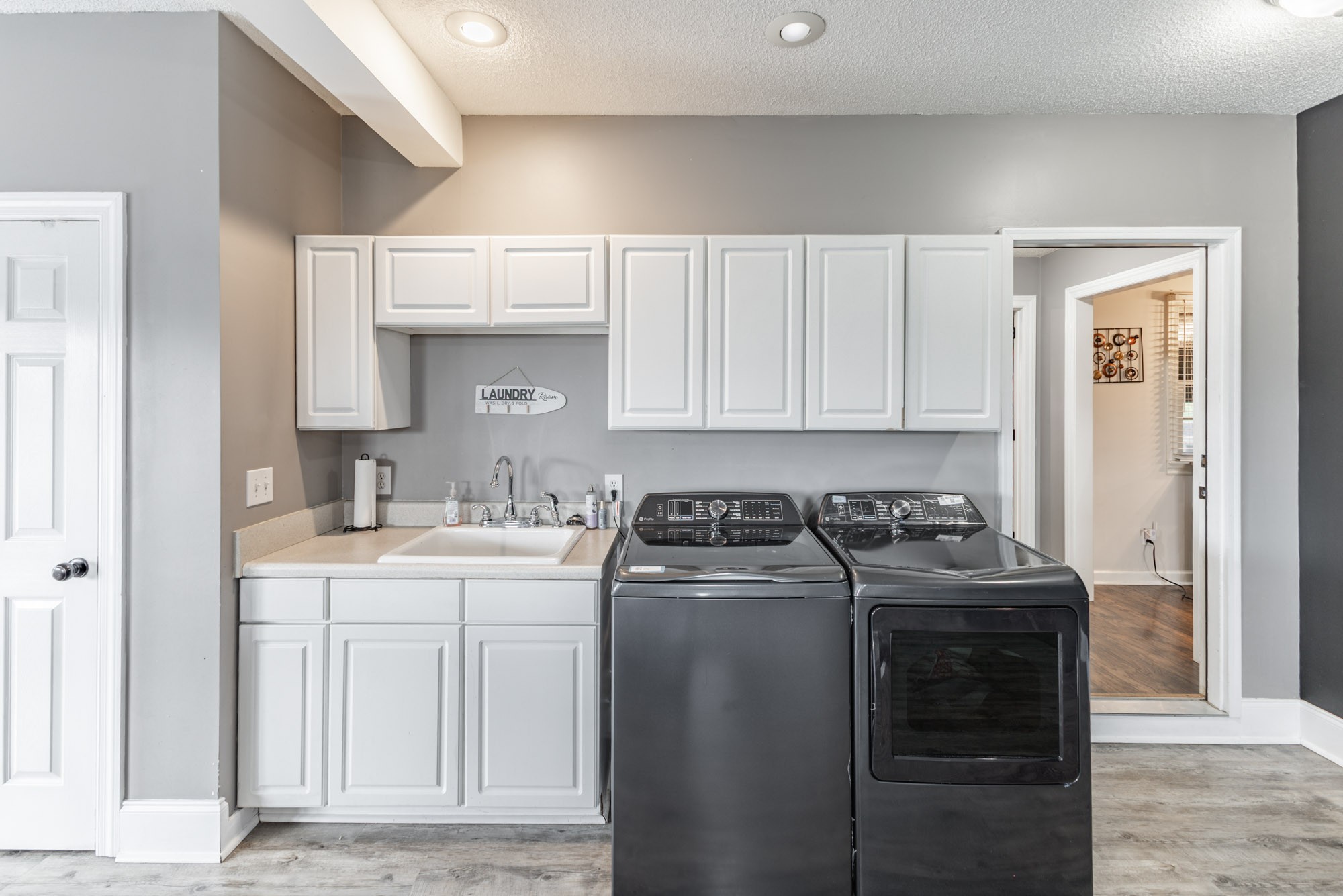 61 Eastridge Road Fayetteville, TN 37334 - Photo 27 of 42 a kitchen with a stove sink and cabinets