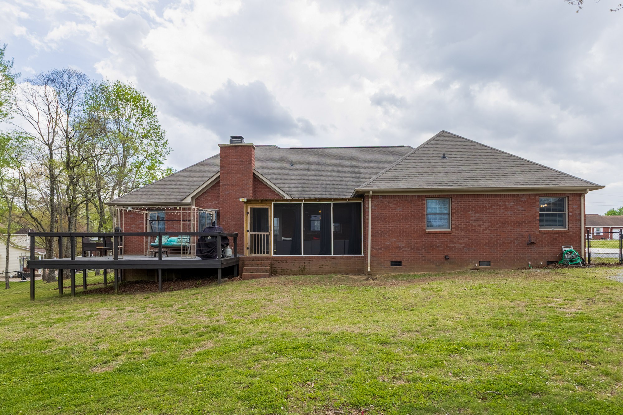 61 Eastridge Road Fayetteville, TN 37334 - Photo 40 of 42 a view of a house with a garden and trees