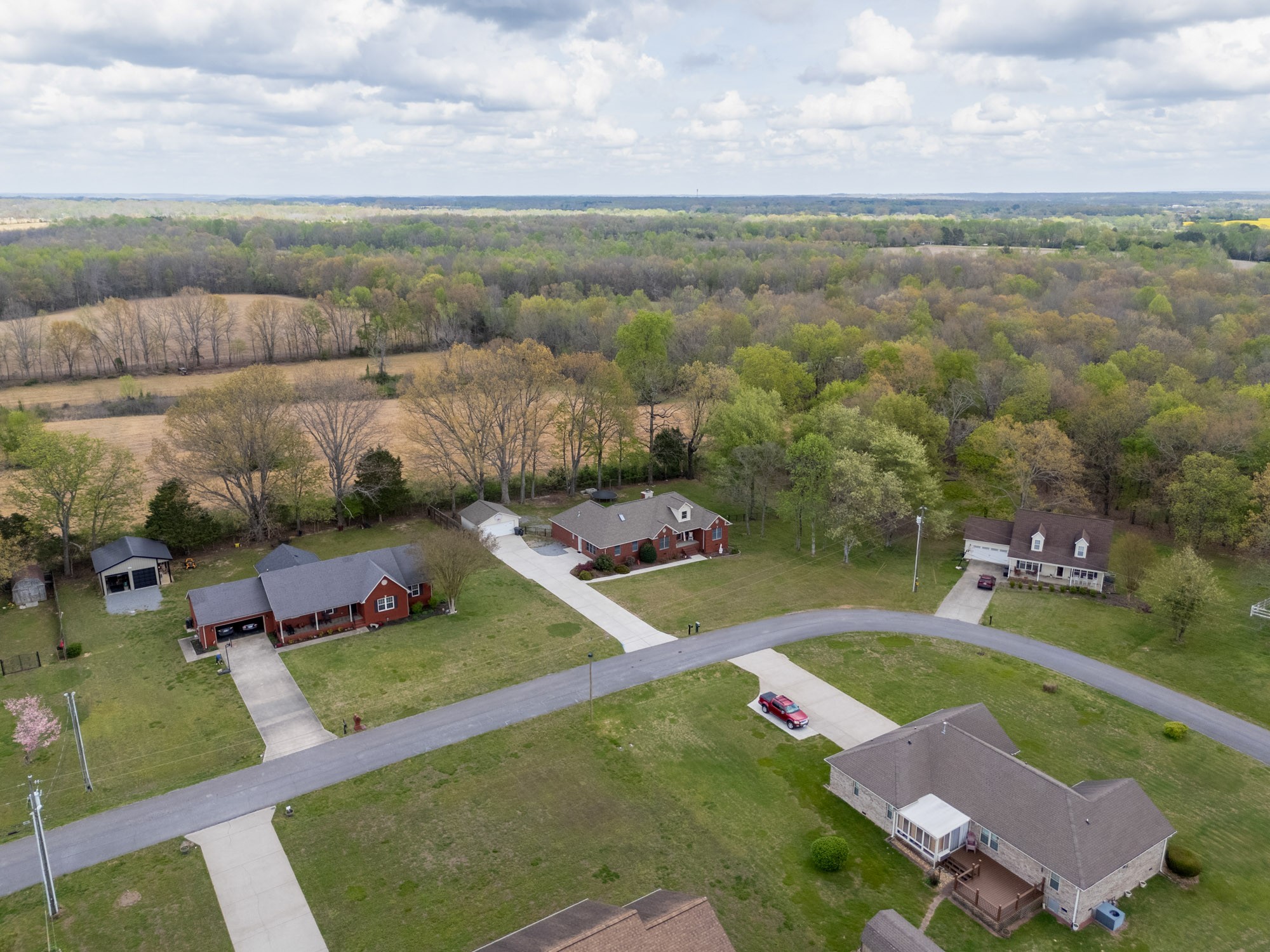 61 Eastridge Road Fayetteville, TN 37334 - Photo 4 of 42 an aerial view of a house with yard swimming pool and outdoor seating