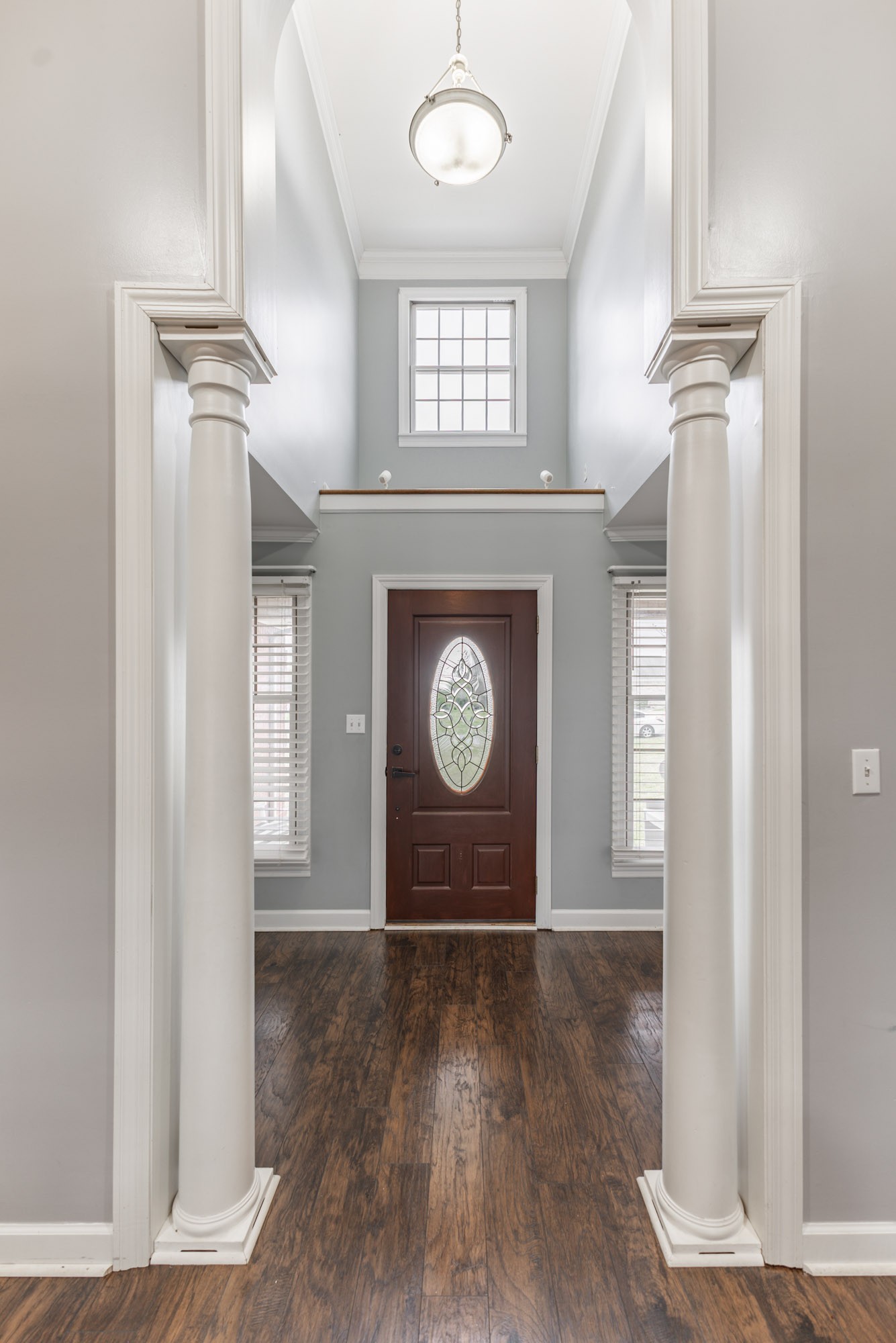 61 Eastridge Road Fayetteville, TN 37334 - Photo 7 of 42 an empty room with wooden floor and windows