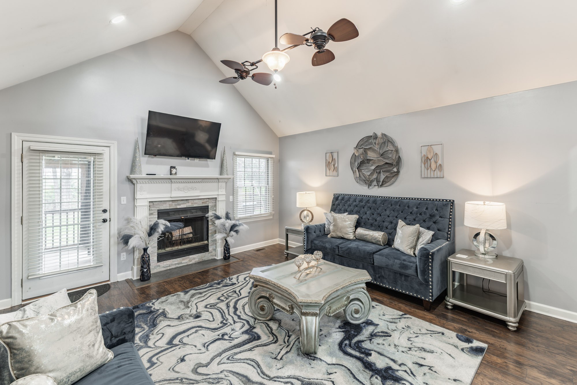 61 Eastridge Road Fayetteville, TN 37334 - Photo 9 of 42 a living room with furniture a flat screen tv and a fireplace