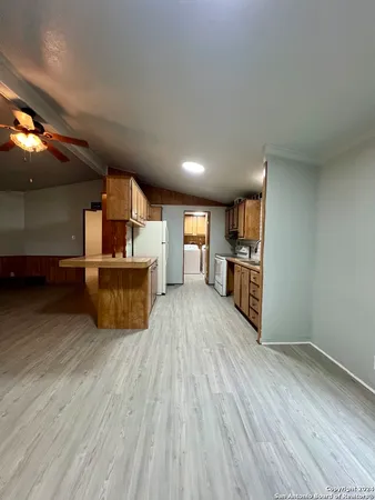 a view of kitchen with wooden floor
