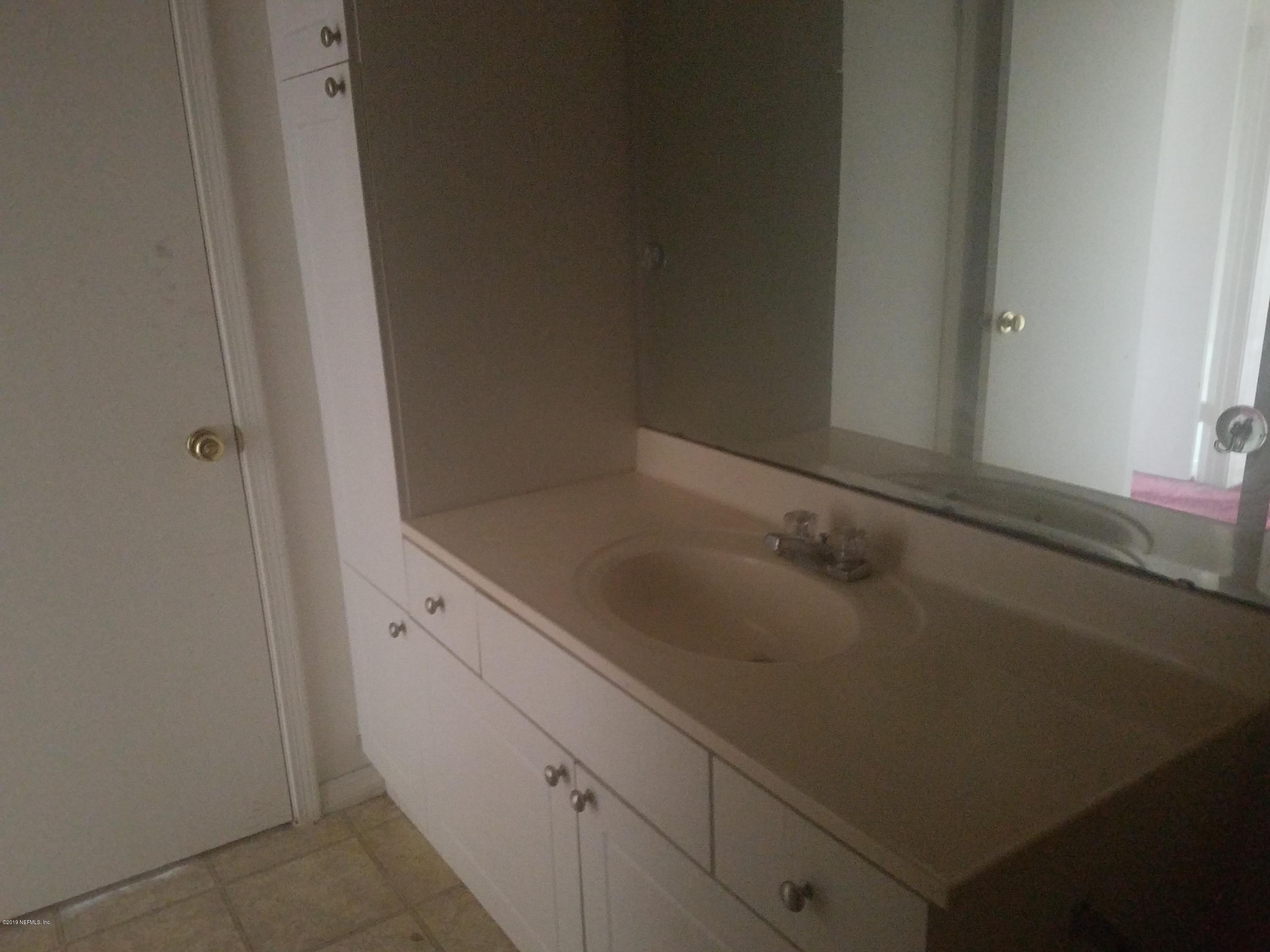 10200 Belle Rive Boulevard, Unit 256 Jacksonville, FL 32256 - Photo 12 of 18 a close view of sink and tap