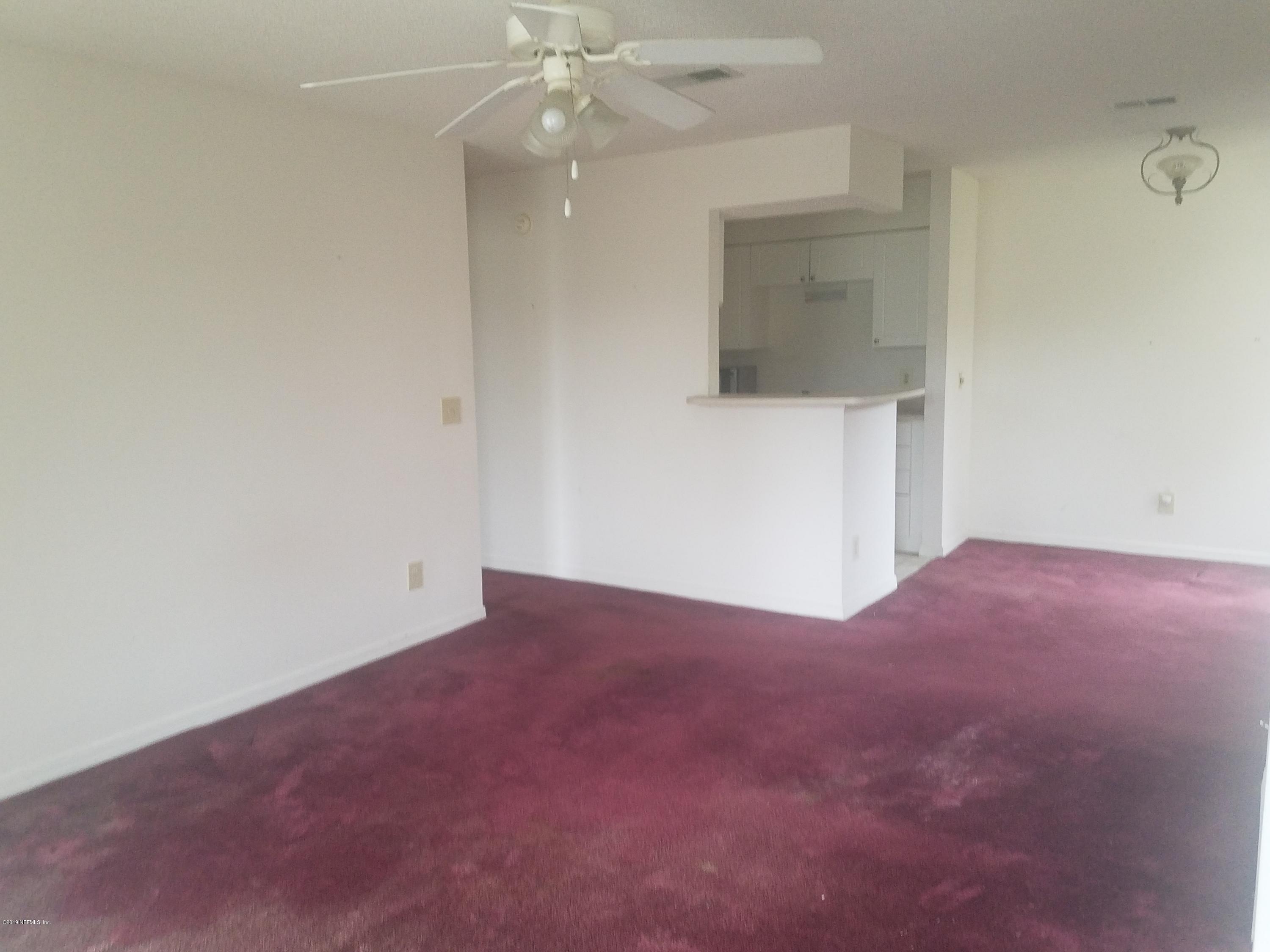 10200 Belle Rive Boulevard, Unit 256 Jacksonville, FL 32256 - Photo 8 of 18 an empty room with a bathroom