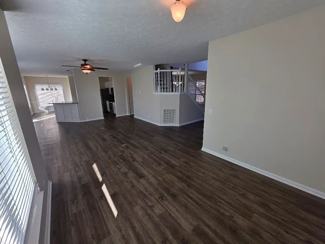 a view of livingroom with furniture and wooden floor
