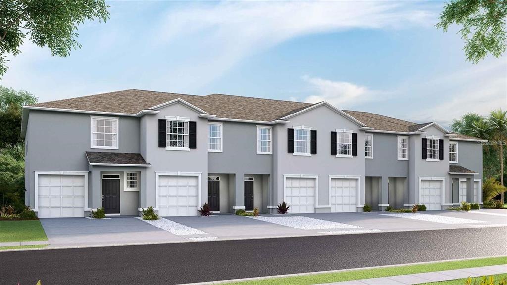 32311 Turtle Grace Loop Wesley Chapel, FL 33545 - Photo 21 of 23 a front view of a house with a garage