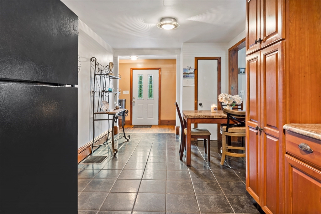 16 Martin Street Rehoboth, MA 02769 - Photo 17 of 38 a dining room with furniture and a window