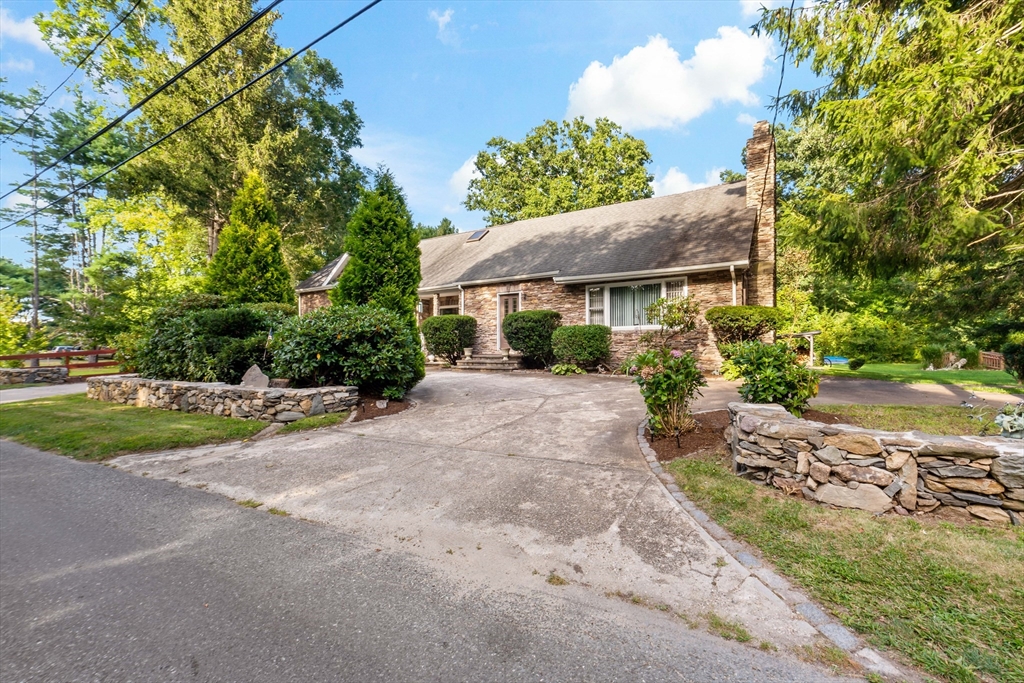 16 Martin Street Rehoboth, MA 02769 - Photo 2 of 38 a view of a house with a yard and street