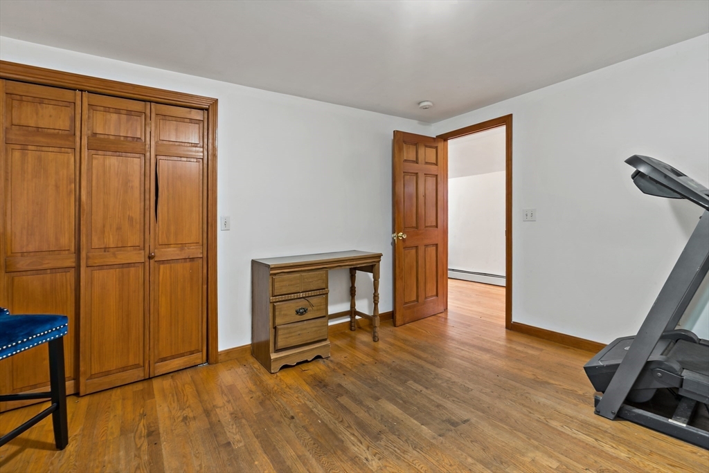 16 Martin Street Rehoboth, MA 02769 - Photo 21 of 38 a view of a room with wooden floor and cabinet