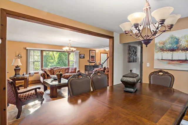 a view of a dining room with furniture window and outside view